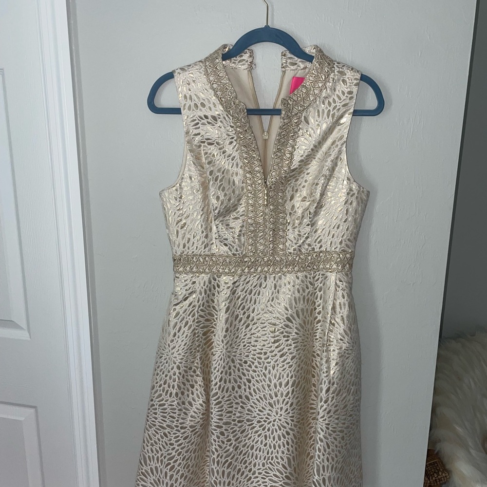 Gold cocktail dress by Lilly